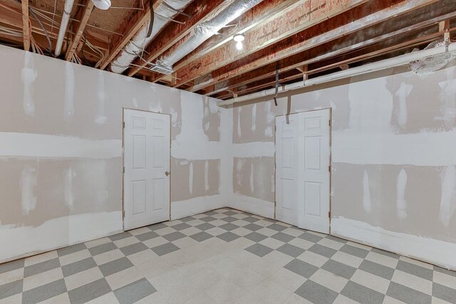 2623 Lindsey Grace Ln, Buford, GA 30519 - unfinished basement featuring light flooring