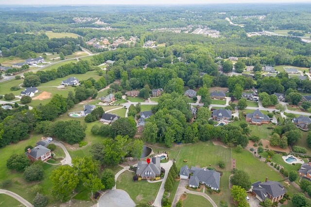 2623 Lindsey Grace Ln, Buford, GA 30519 - aerial view of property and surrounding area featuring nearby suburban area and a forest