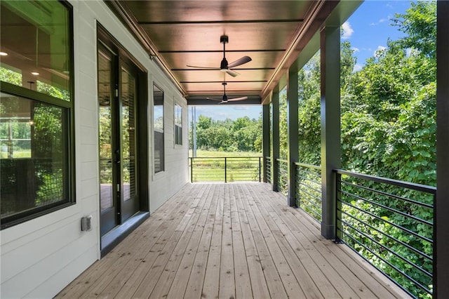 wooden terrace with ceiling fan