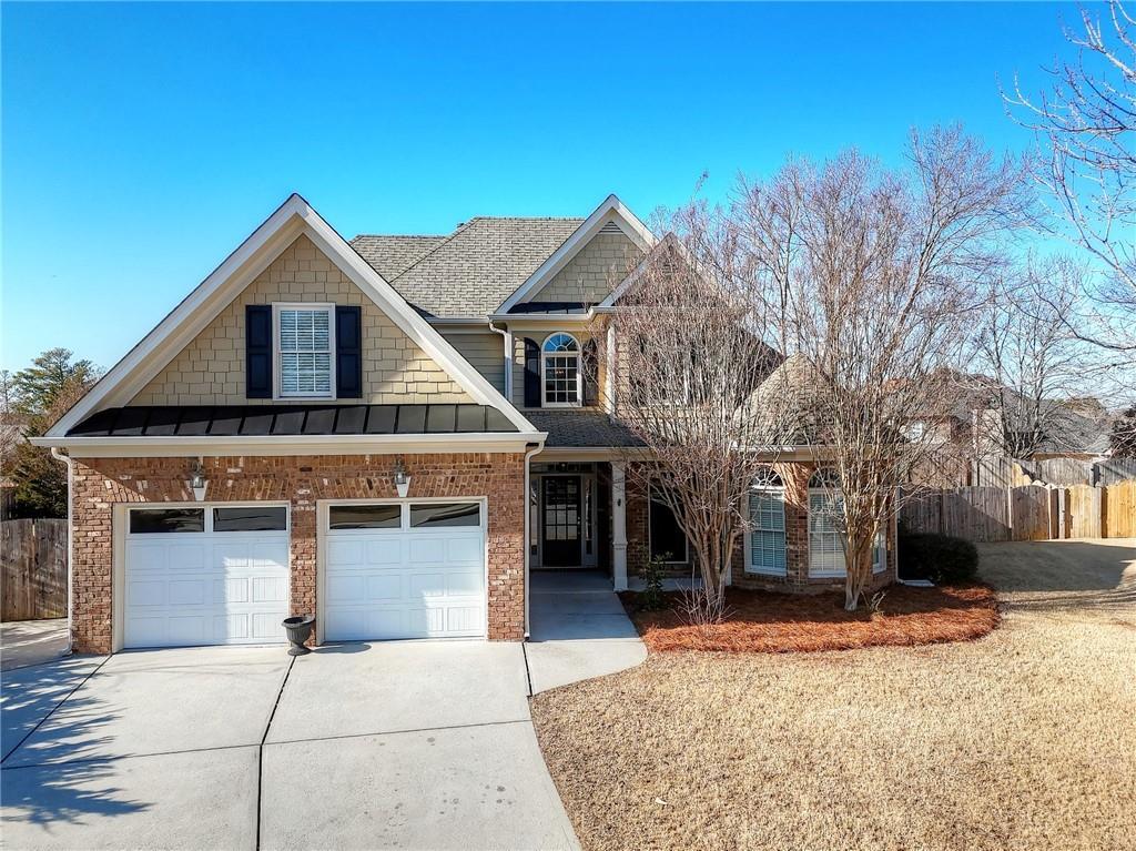 craftsman-style home featuring a garage