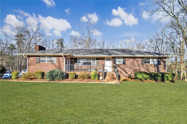 ranch-style house with a front yard, covered porch, brick siding, and a chimney