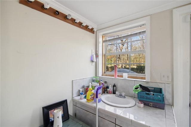 bathroom with decorative backsplash and vanity