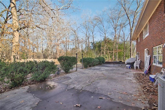 view of patio with central AC