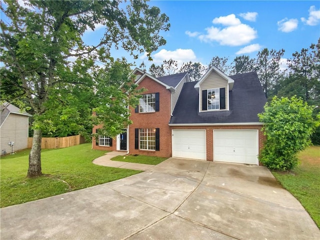 view of front of home with a front yard and a garage