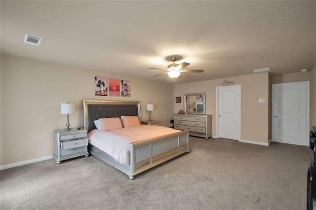 bedroom with ceiling fan and carpet floors