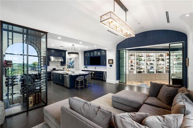 3286 Northside Pkwy NW Unit Ph2, Atlanta, GA 30327 - living room with lofted ceiling, dark wood finished floors, and a chandelier