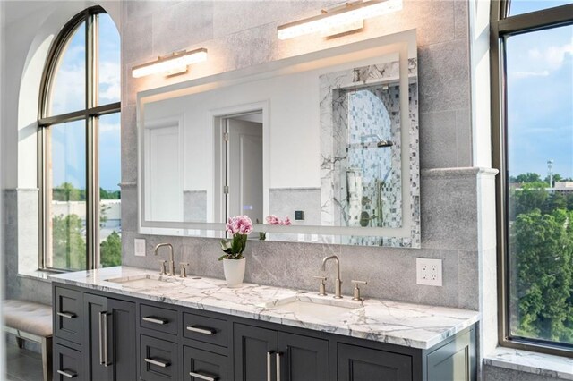 3286 Northside Pkwy NW Unit Ph2, Atlanta, GA 30327 - bathroom with healthy amount of natural light, double vanity, and tasteful backsplash