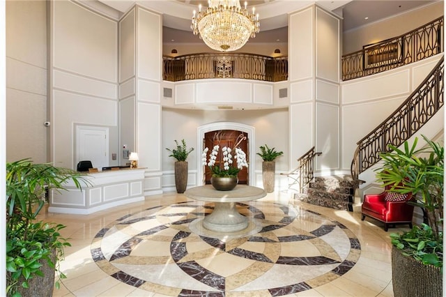 3286 Northside Pkwy NW Unit Ph2, Atlanta, GA 30327 - lobby with a towering ceiling, a decorative wall, and stairs