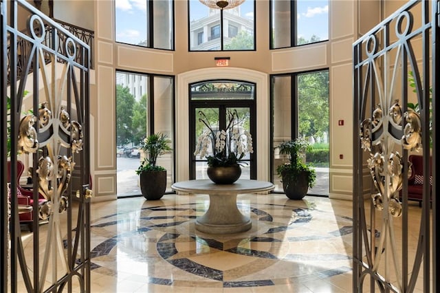 3286 Northside Pkwy NW Unit Ph2, Atlanta, GA 30327 - entrance foyer featuring a decorative wall, a towering ceiling, and marble tiled floors
