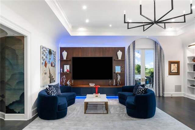 3286 Northside Pkwy NW Unit Ph2, Atlanta, GA 30327 - living area featuring arched walkways, wood finished floors, crown molding, recessed lighting, and a chandelier