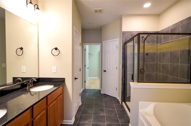 1668 Sabastian Pt NE, Atlanta, GA 30329 - full bath with a stall shower, a bath, tile patterned floors, double vanity, and a closet