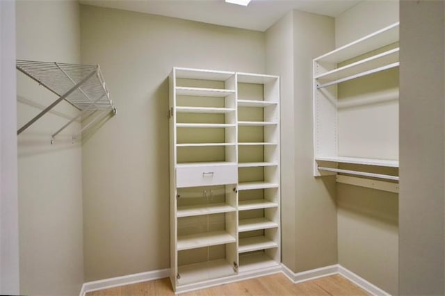 1668 Sabastian Pt NE, Atlanta, GA 30329 - spacious closet with wood finished floors
