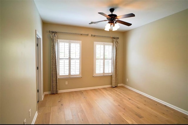 1668 Sabastian Pt NE, Atlanta, GA 30329 - spare room with light wood-style flooring and a ceiling fan