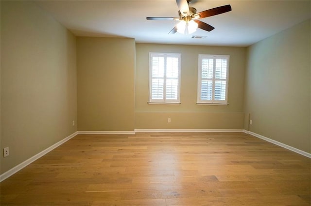 1668 Sabastian Pt NE, Atlanta, GA 30329 - unfurnished room with light wood finished floors and ceiling fan