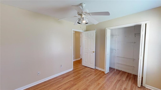 unfurnished bedroom featuring a closet, ceiling fan, and light hardwood / wood-style flooring