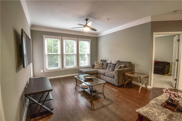 living room featuring ceiling fan, crown molding, and dark hardwood / wood-style flooring