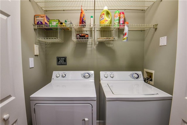 laundry room with washer and dryer