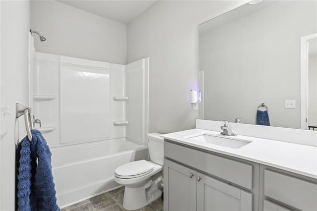 full bathroom with shower / washtub combination, vanity, and toilet