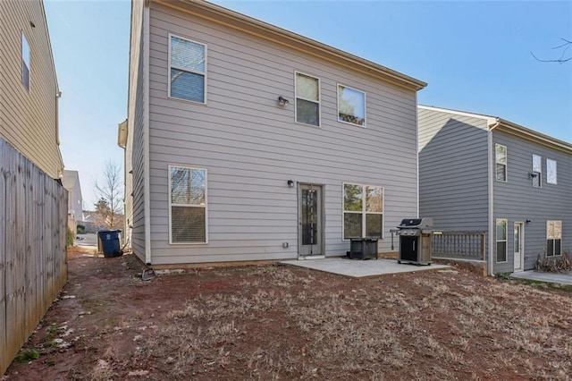 back of house featuring a patio