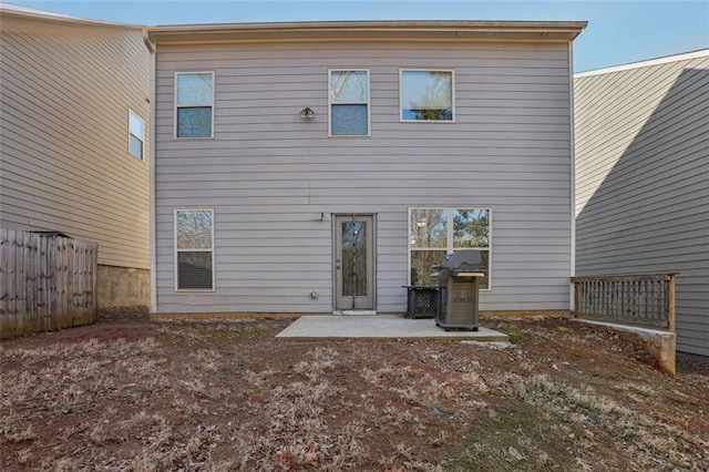 rear view of house featuring a patio