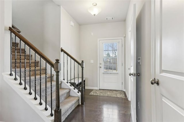 entrance foyer with dark wood-type flooring