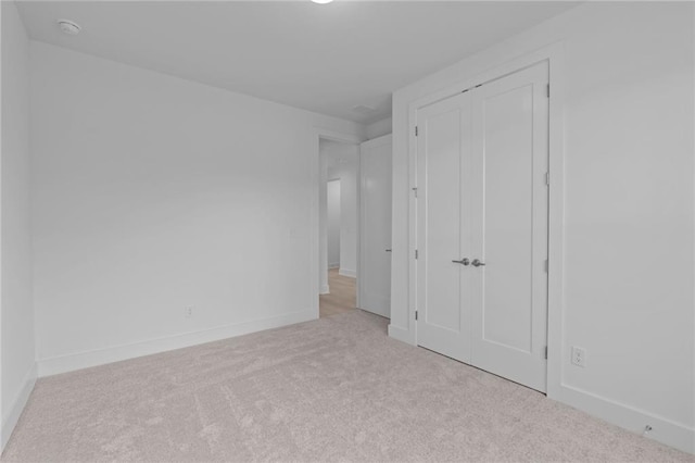 2040 Ripple Park Bnd, Canton, GA 30114 - unfurnished bedroom featuring carpet flooring and a closet
