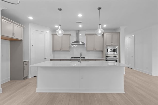 2040 Ripple Park Bnd, Canton, GA 30114 - kitchen featuring wall chimney exhaust hood, appliances with stainless steel finishes, gray cabinets, light countertops, and recessed lighting