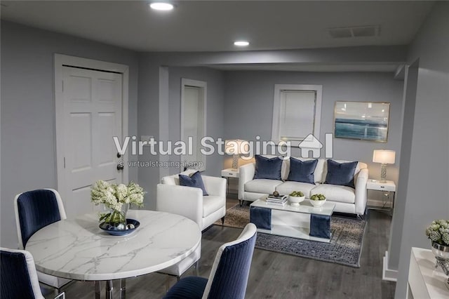 living room with dark wood-type flooring