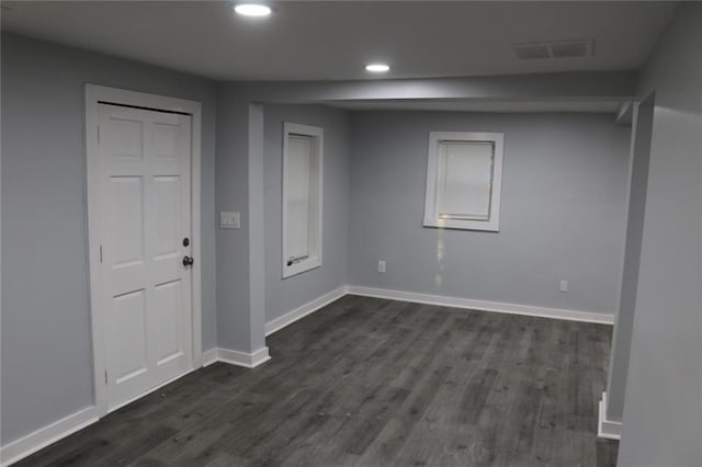 interior space with dark hardwood / wood-style floors