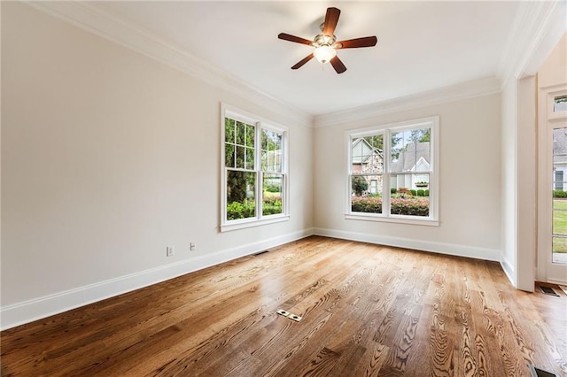 unfurnished room with light hardwood / wood-style flooring, ceiling fan, and ornamental molding