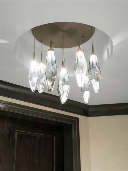 interior details featuring an inviting chandelier