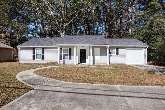 single story home with a garage and a front yard