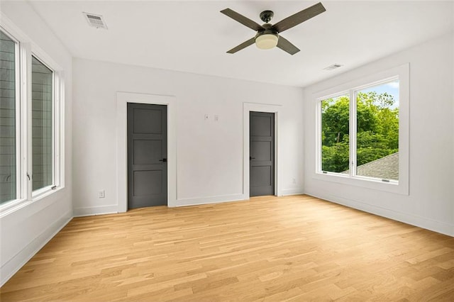 244 Locust St NE Unit B, Atlanta, GA 30317 - unfurnished bedroom with baseboards, light wood-style flooring, and a ceiling fan