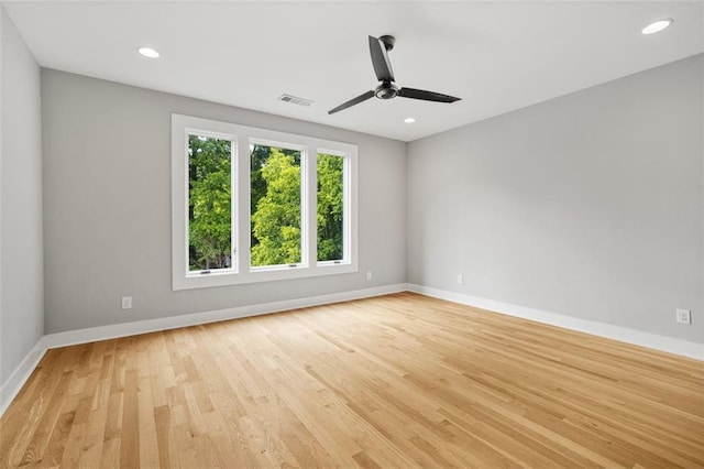 244 Locust St NE Unit B, Atlanta, GA 30317 - empty room featuring light wood-style floors, baseboards, a ceiling fan, and recessed lighting
