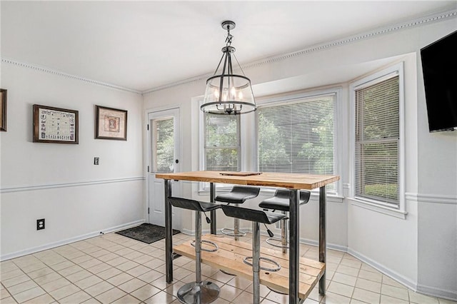 3003 Hanover Ln SE, Conyers, GA 30094 - dining room featuring light tile patterned floors and a chandelier