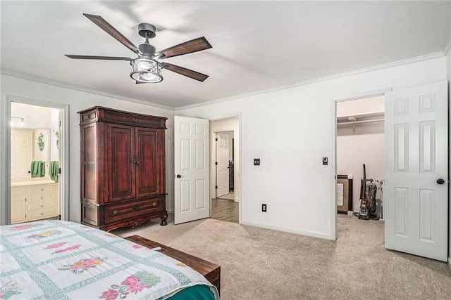 3003 Hanover Ln SE, Conyers, GA 30094 - bedroom featuring ornamental molding, light carpet, a spacious closet, ensuite bathroom, and a ceiling fan