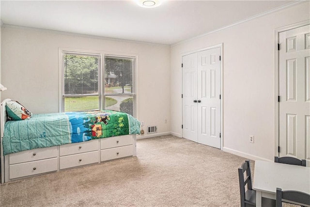 3003 Hanover Ln SE, Conyers, GA 30094 - bedroom featuring crown molding, carpet flooring, and a closet