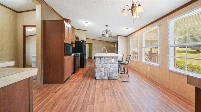 88 Turner Rd, Jasper, GA 30143 - clothes washing area featuring wood finished floors and ornamental molding