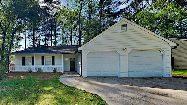 single story home featuring a garage and covered porch