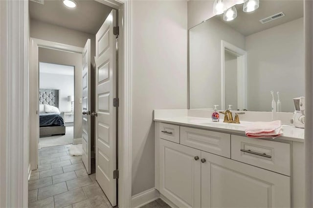 bathroom featuring vanity and tile patterned floors