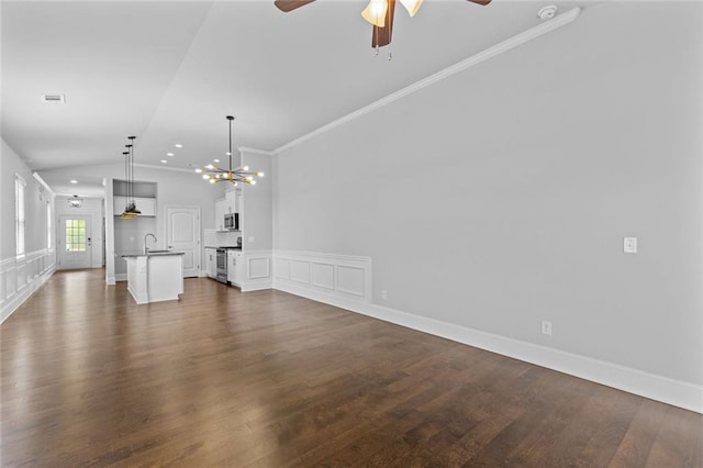 6469 Crosscreek Ln, Flowery Branch, GA 30542 - unfurnished living room with vaulted ceiling, ceiling fan, dark wood-style floors, a chandelier, and ornamental molding