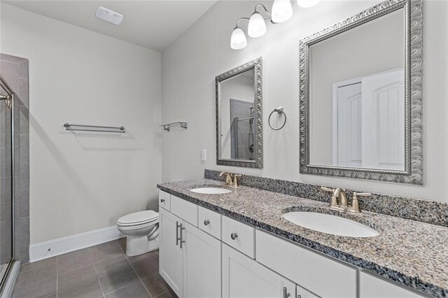 6469 Crosscreek Ln, Flowery Branch, GA 30542 - full bath with a stall shower, double vanity, and tile patterned floors