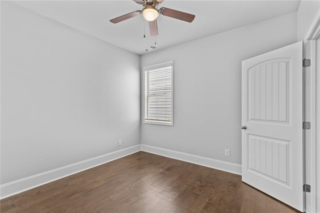 6469 Crosscreek Ln, Flowery Branch, GA 30542 - spare room with dark wood-style flooring and a ceiling fan