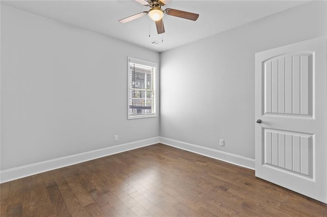 6469 Crosscreek Ln, Flowery Branch, GA 30542 - empty room featuring dark wood-style floors and a ceiling fan