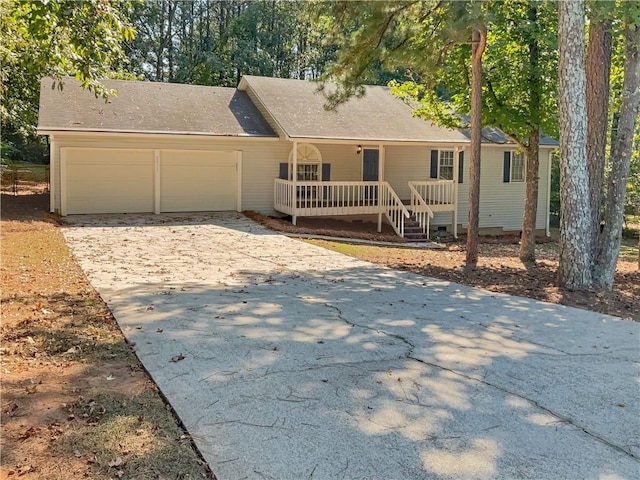 ranch-style home featuring a garage and a porch