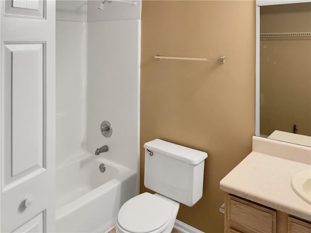 full bathroom featuring  shower combination, vanity, and toilet