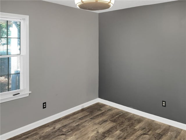 empty room featuring dark hardwood / wood-style floors