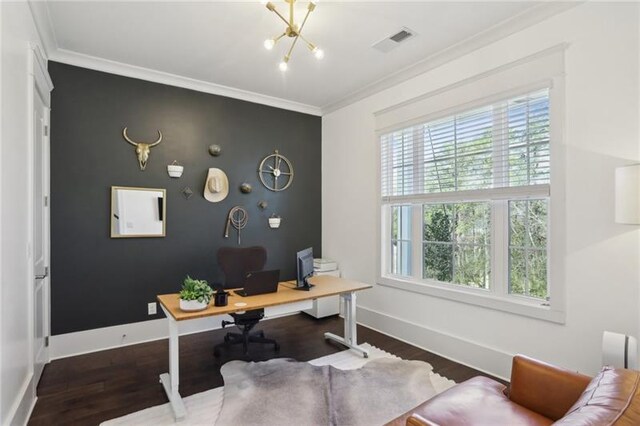 home office with crown molding, baseboards, visible vents, and a wealth of natural light