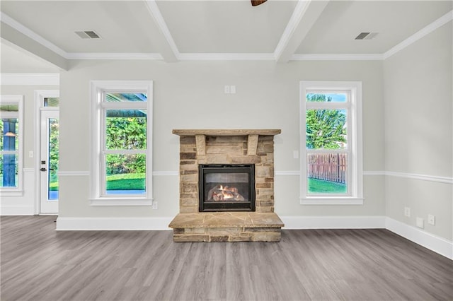 unfurnished living room featuring crown molding, a fireplace, and dark hardwood / wood-style flooring