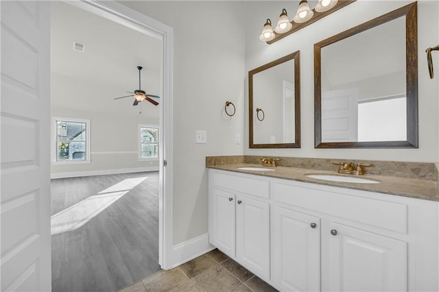 bathroom featuring dual bowl vanity, tile flooring, and ceiling fan